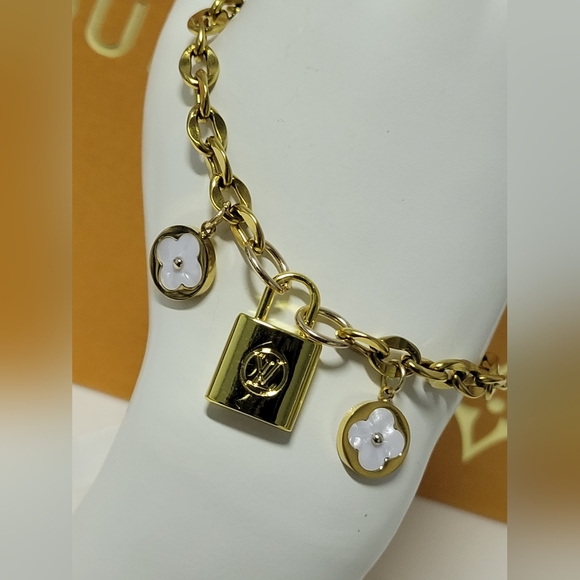 Jewelry - New, Gold Plated Charm Bracelet, LV Double Sided Padlock Zip Pull